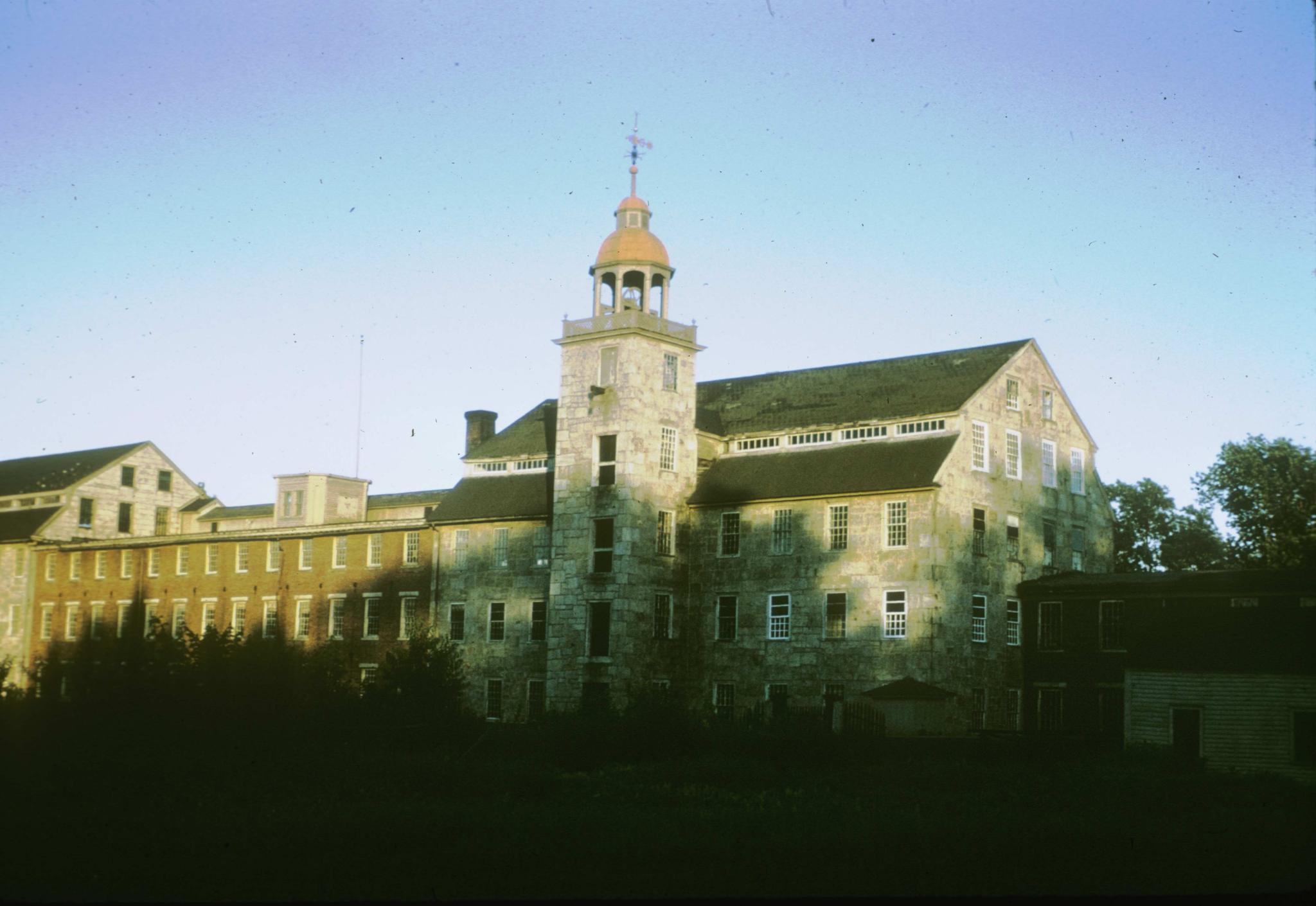 Photograph of the mill showing the interconnected structures.