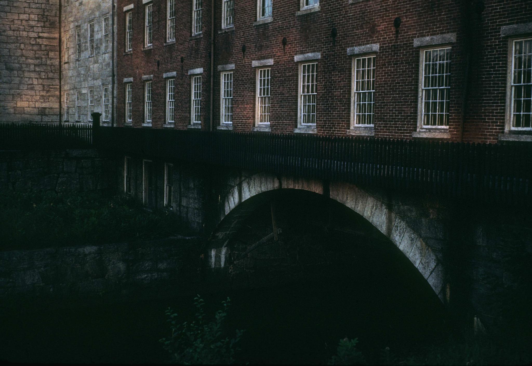 Photograph of the juncture between the old mill and the brick connecting…