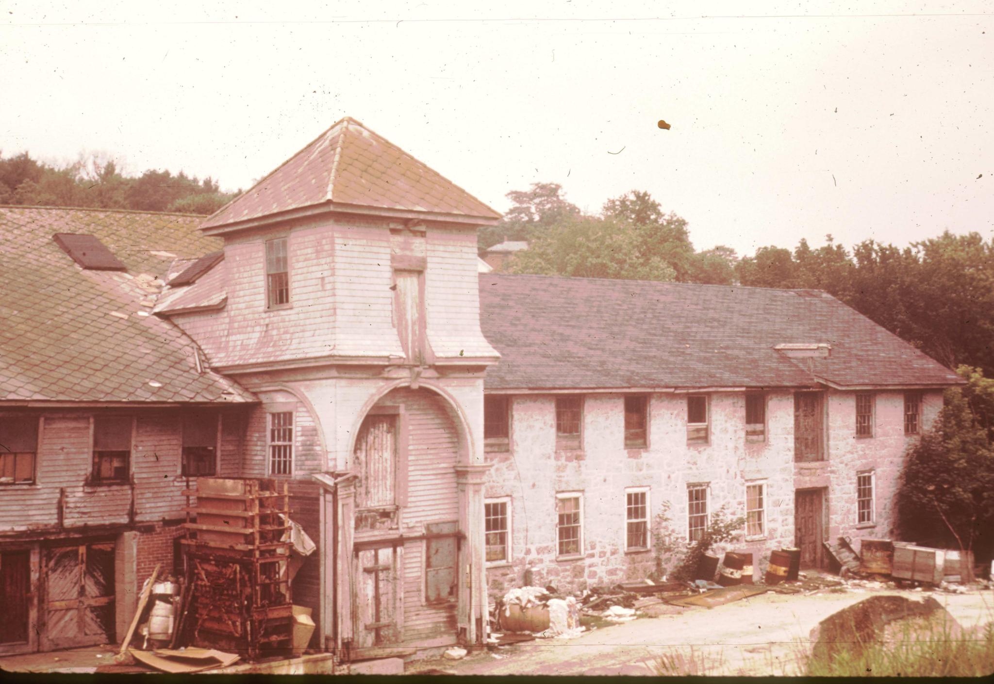 Photograph of an unidentified "pathetic" mill in Massachusetts.