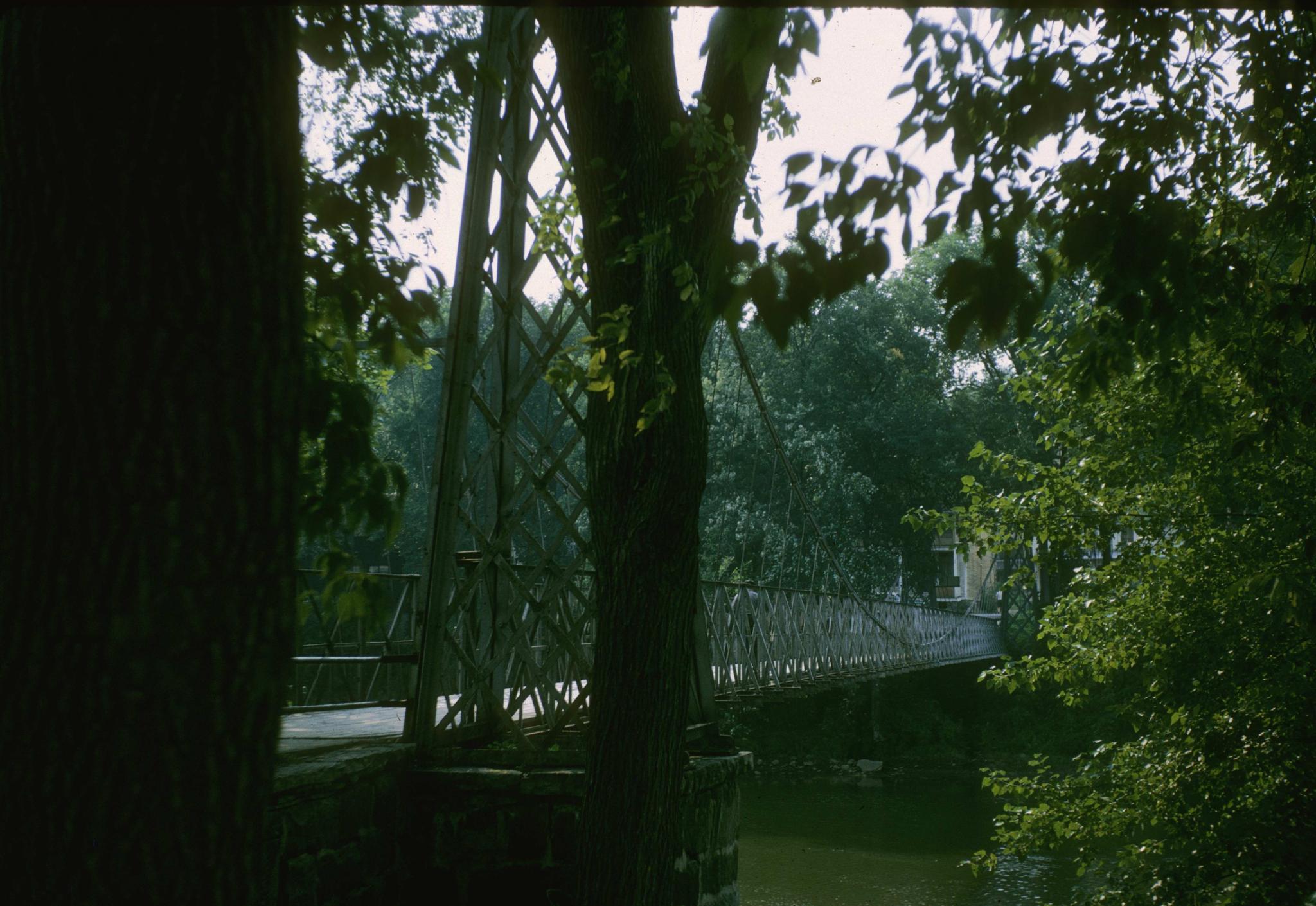 An oblique shot of the bridge showing the length of the span.  Part of the…