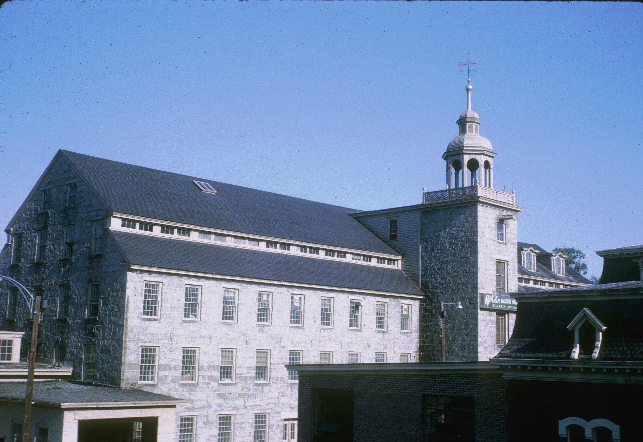 Photograph of the stone mill (The Shop)showing clerestory windows.