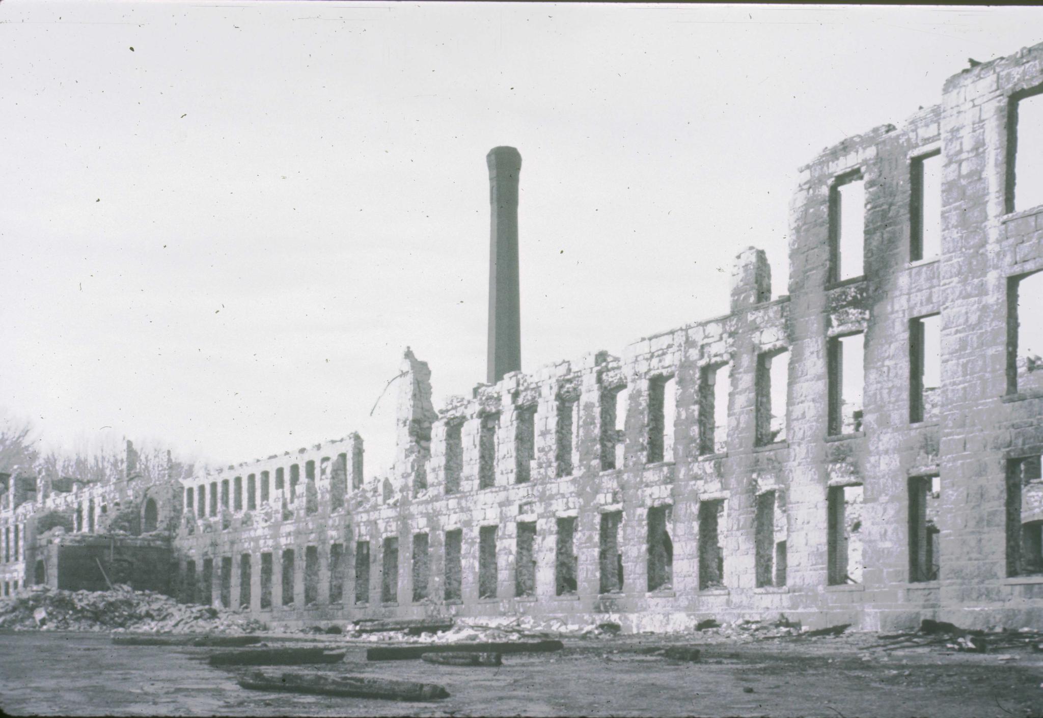 Black and white photograph of the Manchang No. 3 mill after burning in 1975.…