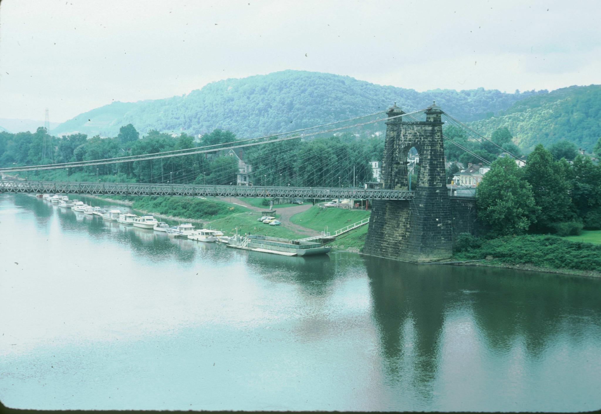 Photograph of the bridge showing one of the support towers and masonry…