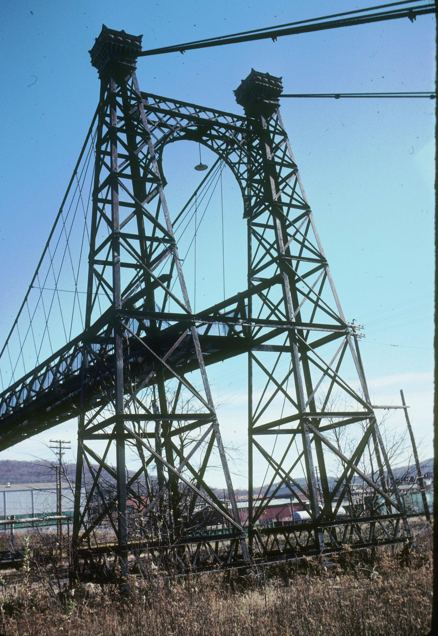 Photograph of support tower and part of span of the bridge.  The photograph…